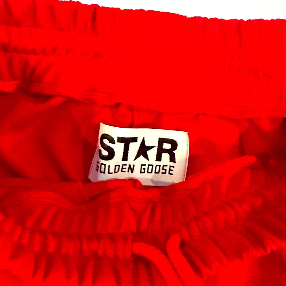 Amazing, red golden goose track pants